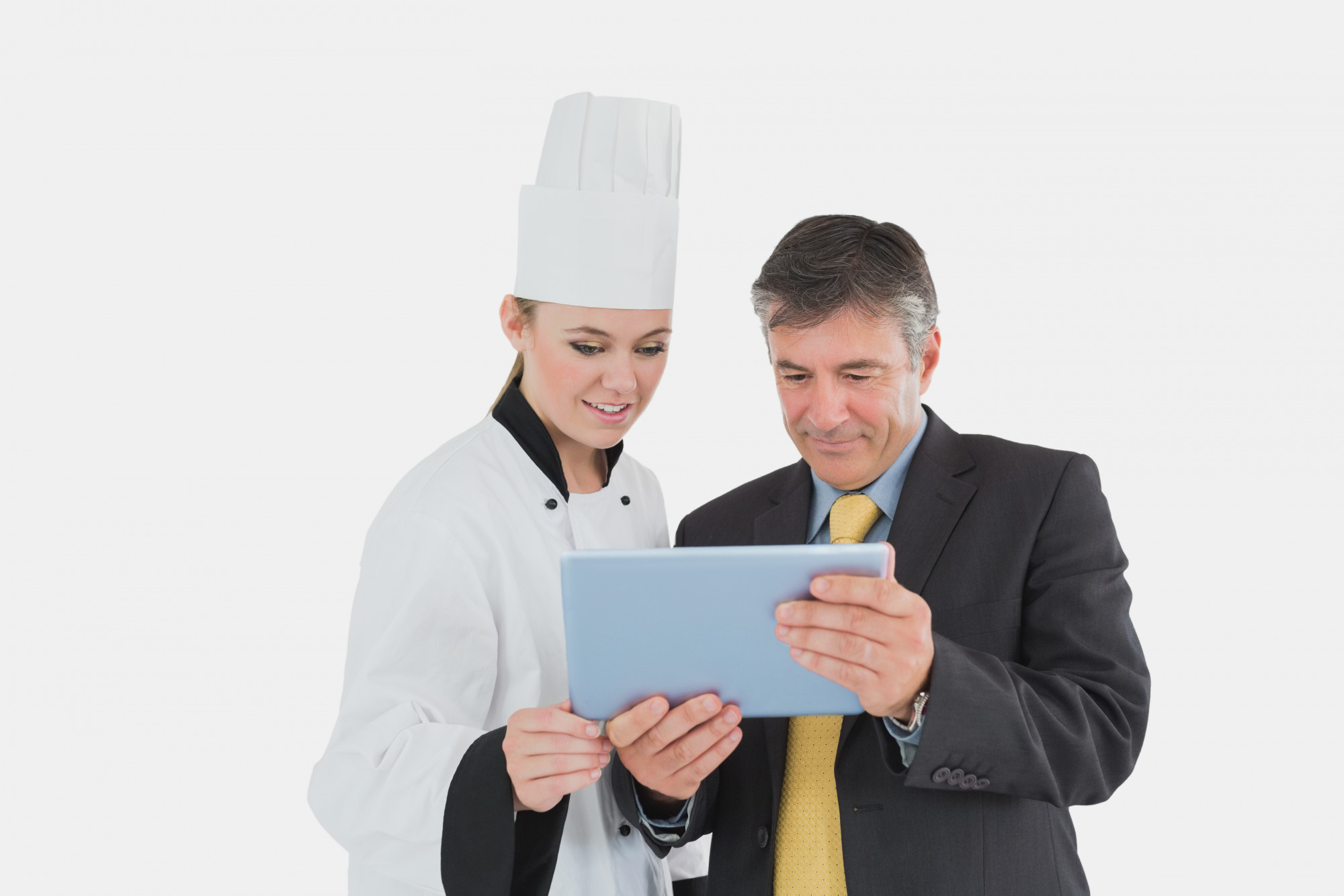 Chef consulting with restaurant manager
